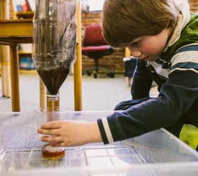 Boy testing water filter