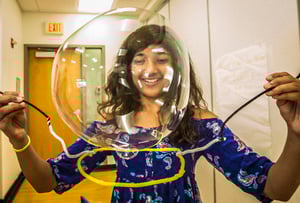 Girl with bubble wand
